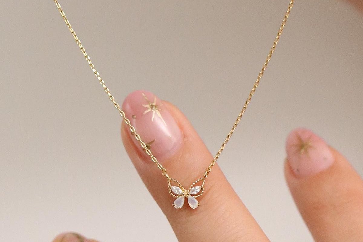 Golden Flutter: The Minimalist Guide to Styling the Butterfly Pendant